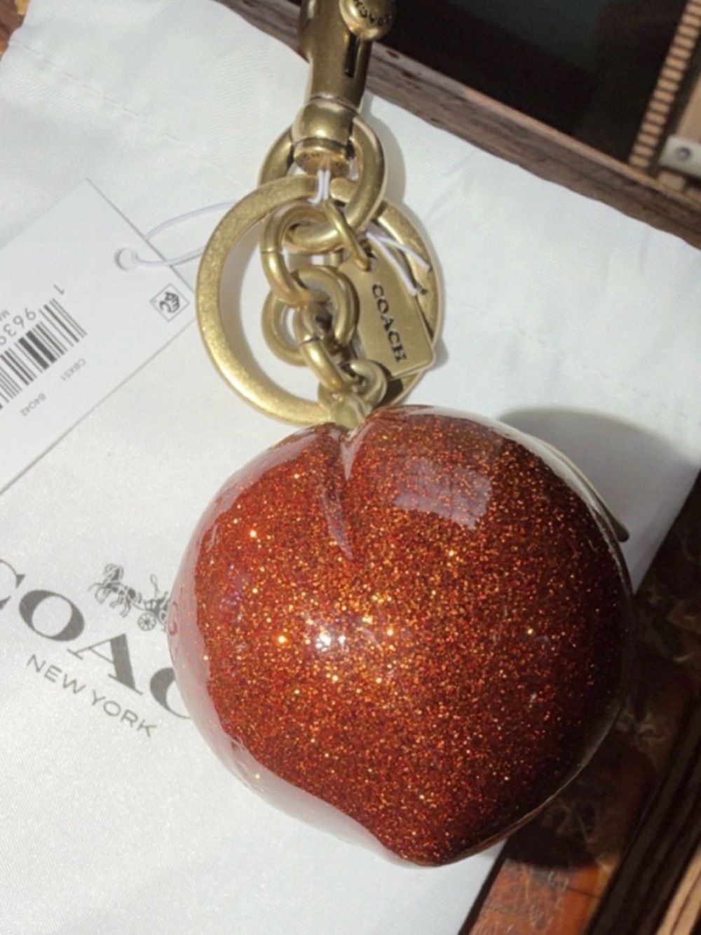 COACH Glitter Peach Keychain - Sparkling Copper/Gold TSITP